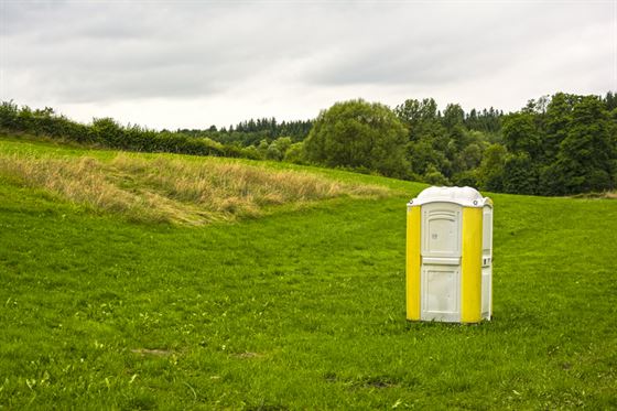 portable loo in field